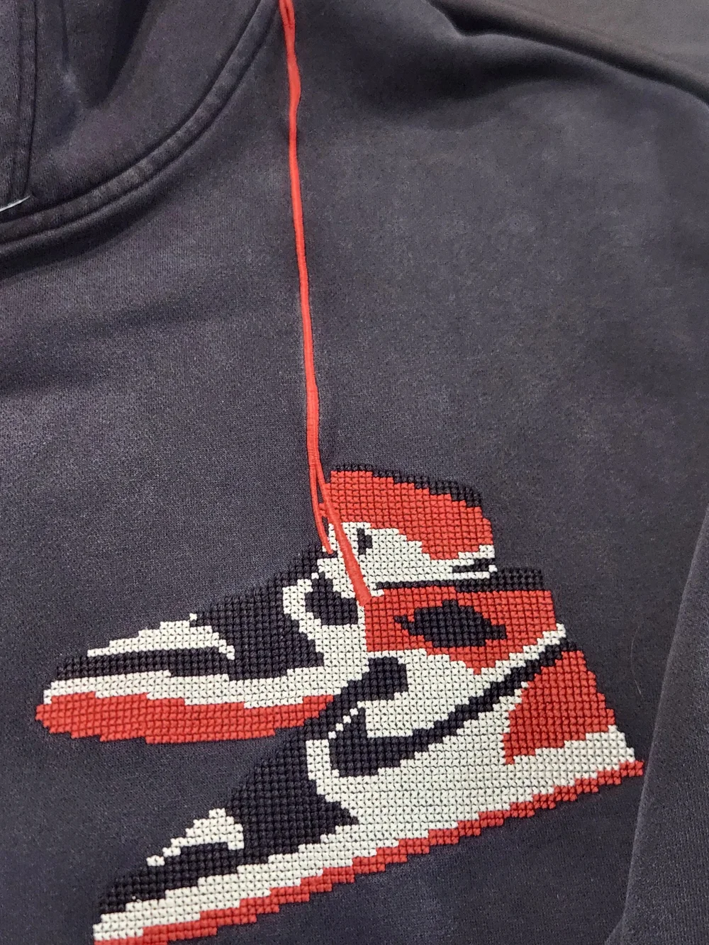 Jordan Black Hoodie with Red and White Sneaker Graphic